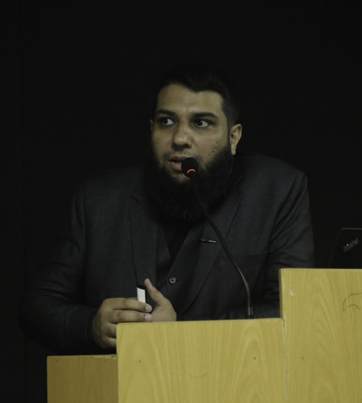 Dr. Hafiz Hassaan Saeed presenting at a conference